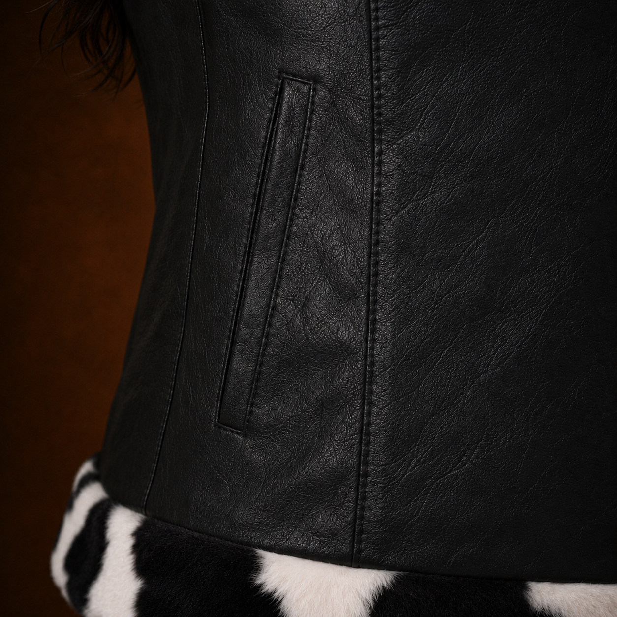 FINEHIDE WOMEN’S BLACK GENUINE LEATHER JACKET WITH BLACK & WHITE FUR-STYLE TRIM